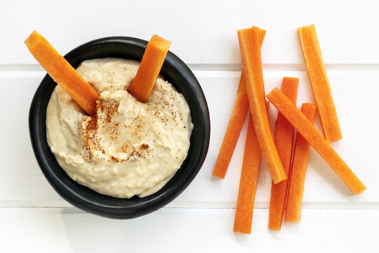 Carrots and hummus make a delicious and healthy snack.