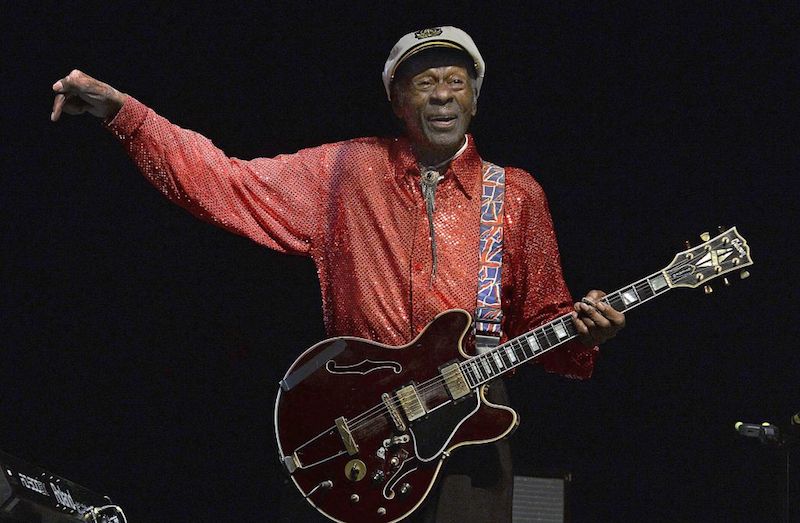 Chuck Berry holds a guitar and sings at a concert in 2013. Chuck Berry holds a guitar and sings at a concert in 2013.