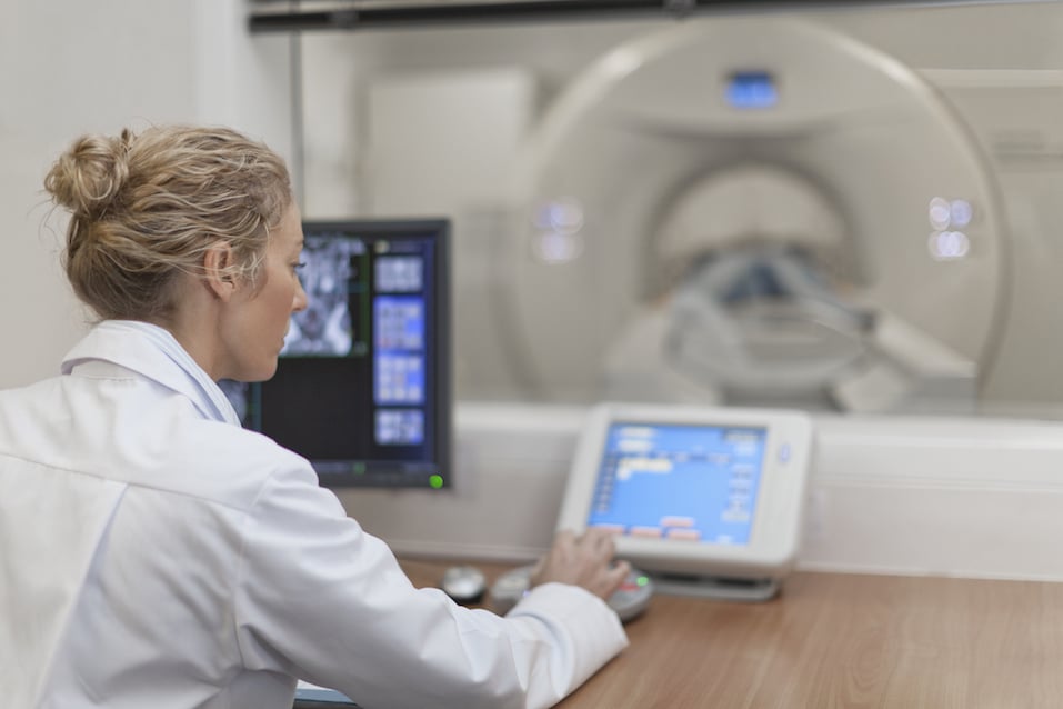 Doctor doing MRI of a patient