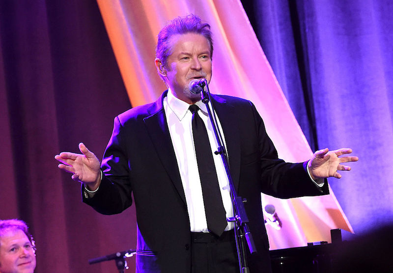 Don Henley holds his hands up to his sides and speaks into a microphone at the T.J. Martell Foundation 8th Annual Nashville Honors Gala at the Omni Nashville Hotel.