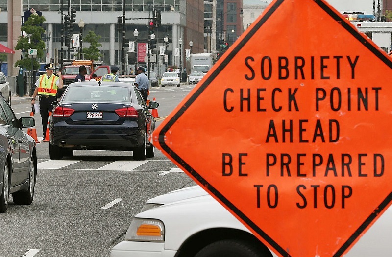 WASHINGTON, DC - AUGUST 14: Washington Metropolitan Police conduct a sobriety check point associated with a news conference on drunk driving, on August 14, 2012 in Washington, DC. The National Highway Traffic Safety Administration (NHTSA) held a news conference to discuss the national anti-drunk driving campaign and law enforcement crackdown.