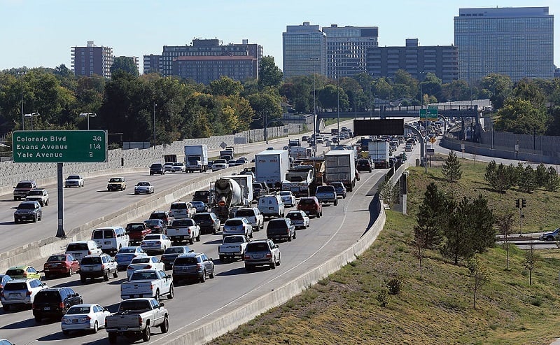 DENVER, CO - OCTOBER 02: Traffic drives on the segement of Interstate 25 near the venue for the first presidential debate on October 2, 2012 in Denver, Colorado. The Interstate will be closed from 5 PM until 10 PM when Republican presidential candidate Mitt Romney will square off against U.S. President Barack Obama in the first of three debates on October 3.