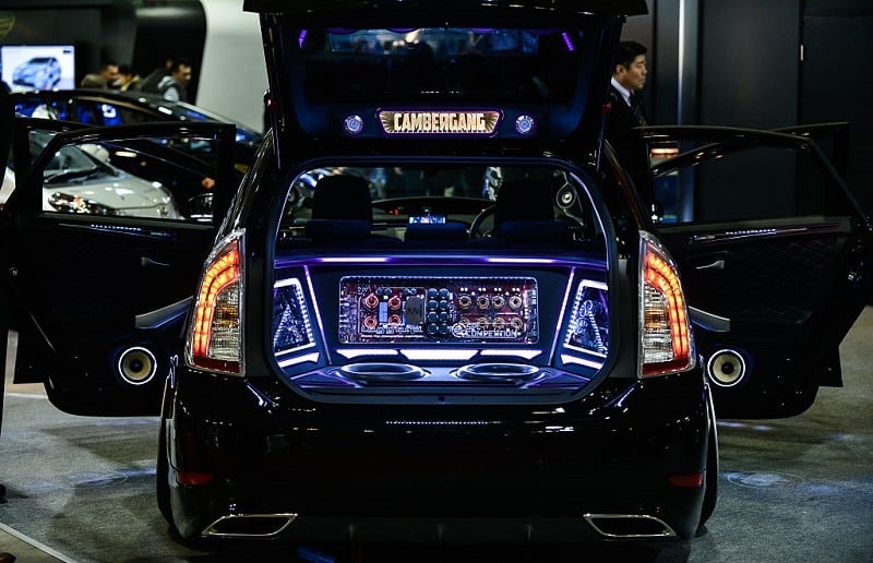 View of the back of a Toyota Prius with upgraded car stereo and speakers