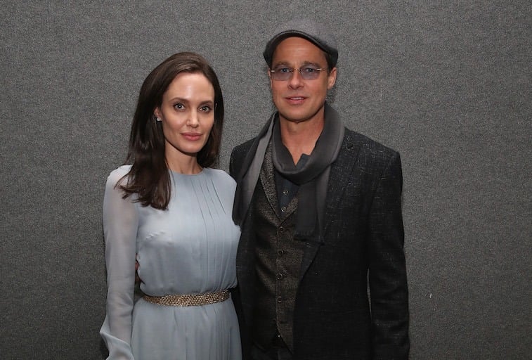 Angelina Jolie (L) and Brad Pitt attend an official Academy Screening of BY THE SEA hosted by The Academy Of Motion Picture Arts And Sciences