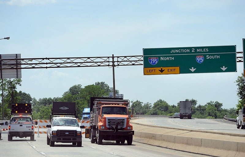 WILMINGTON, DE - JUNE 04: Trucks and barriers block the entrance to I-495 north to the bridge over the Christina River June 4, 2014 in Wilmington, Delaware. The bridge was closed indefinitely after four support columns were discovered to be tilting.