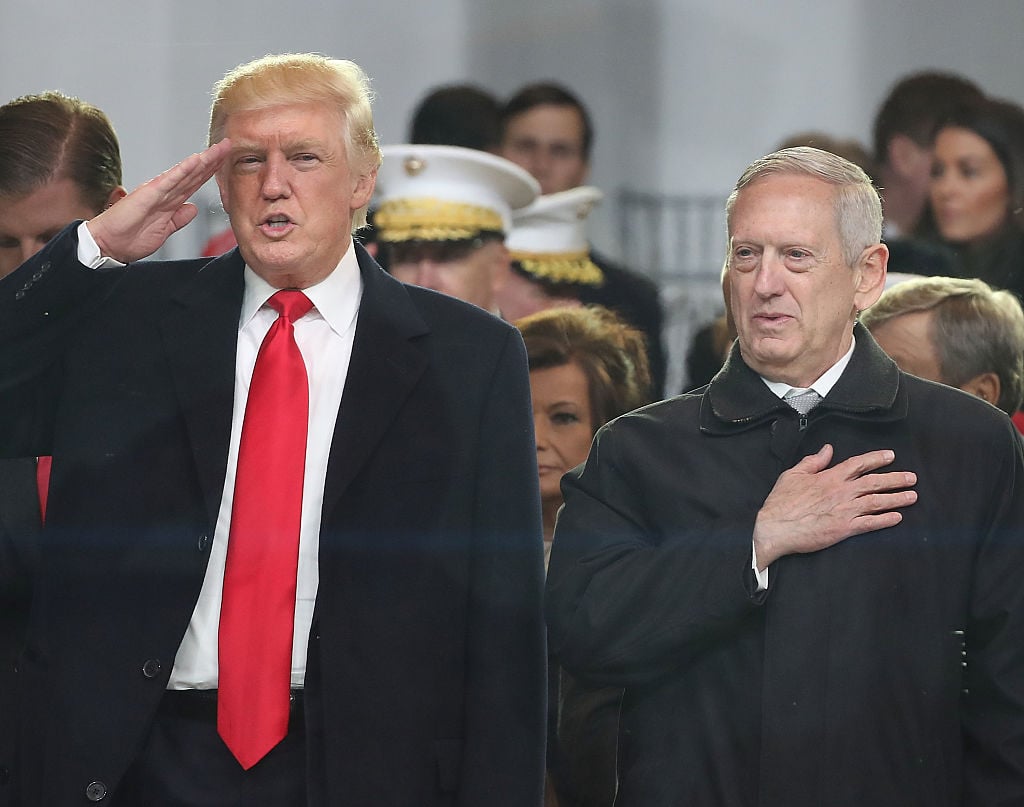 President Donald Trump stands with Secretary of Defense James Mattis.
