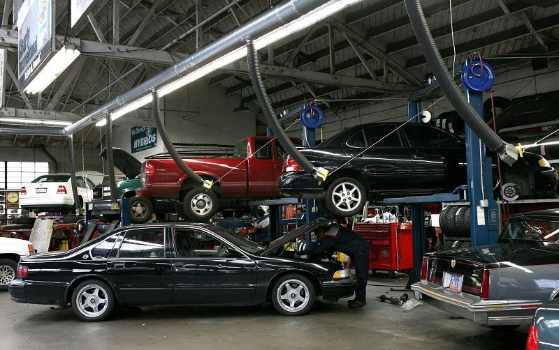 SAN FRANCISCO - JANUARY 05: Cars line up to be serviced at Brake and Wheel Service Center January 5, 2009 in San Francisco, California. According to a survey by the Automotive Service Association, sales at auto repair shops increased 16 percent in November as people make a small investment by way of repairs and maintenance to extend the life of their cars instead of buying a new one.