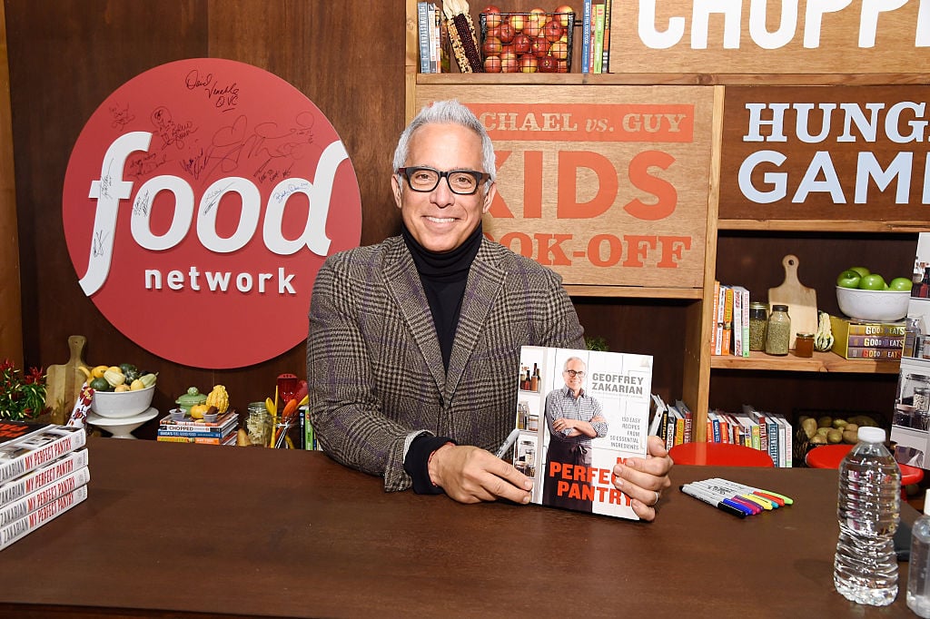 Chef Geoffrey Zakarian signs copies of his book "My Perfect Pantry" at the Grand Tasting
