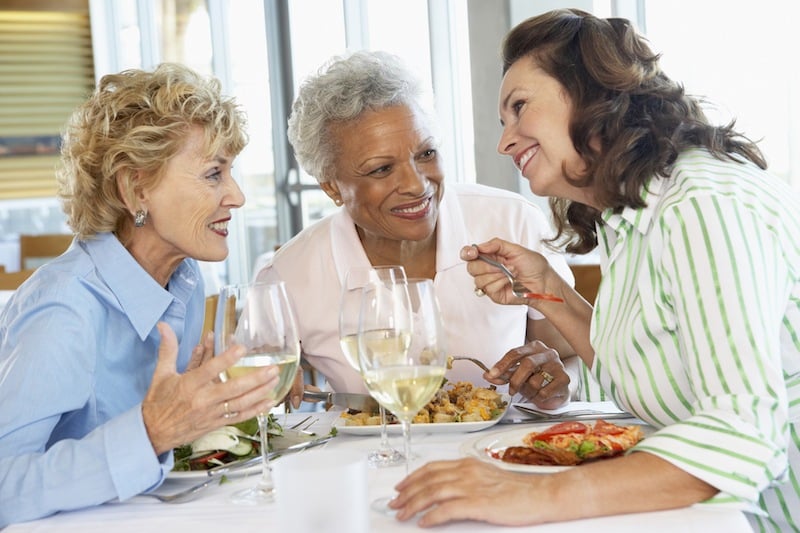 elderly group of women having a meal elderly group of women having a meal