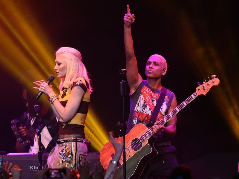 Gwen Stefani and Tony Kanal performing onstage Gwen Stefani and Tony Kanal performing onstage