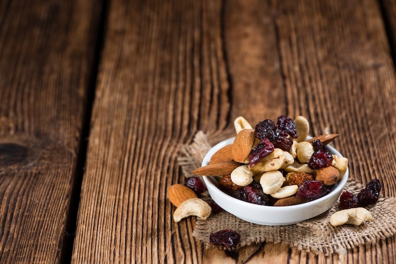 Trail mix on wooden background Trail mix on wooden background