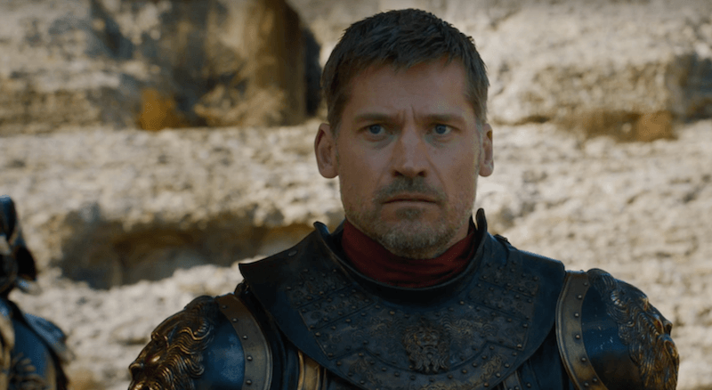 Jaime Lannister stands in armor and looks ahead