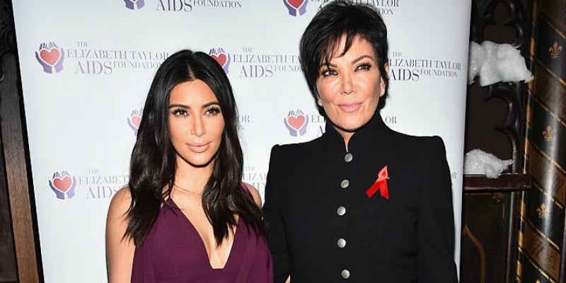 Kim Kardashian and Kris Jenner pose together on the red carpet. Kim Kardashian and Kris Jenner pose together on the red carpet.