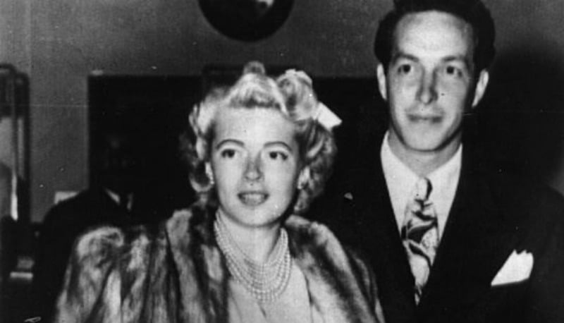 A black and white photo of Lana Turner and Steve Crane posing together A black and white photo of Lana Turner and Steve Crane posing together