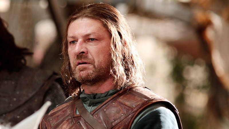 Ned Stark stands and looks ahead. Ned Stark stands and looks ahead.