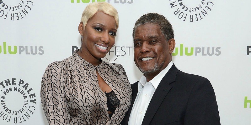 Nene and Gregg Leakes pose together on the red carpet.