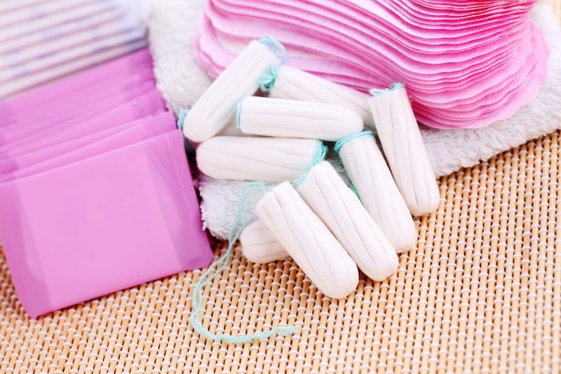 a pile of feminine products in pink