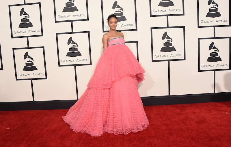 Rihanna poses in a hot pink dress at the 2015 Grammy Awards. Rihanna poses in a hot pink dress at the 2015 Grammy Awards.
