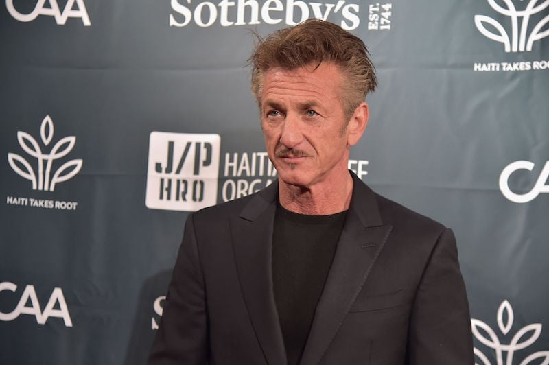 Sean Penn poses for photos at a benefit dinner for 'Rebuild Haiti'. Sean Penn poses for photos at a benefit dinner for 'Rebuild Haiti'.