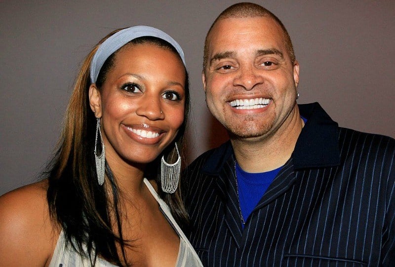 Sinbad and Meredith Adkins are smiling together. Sinbad and Meredith Adkins are smiling together.