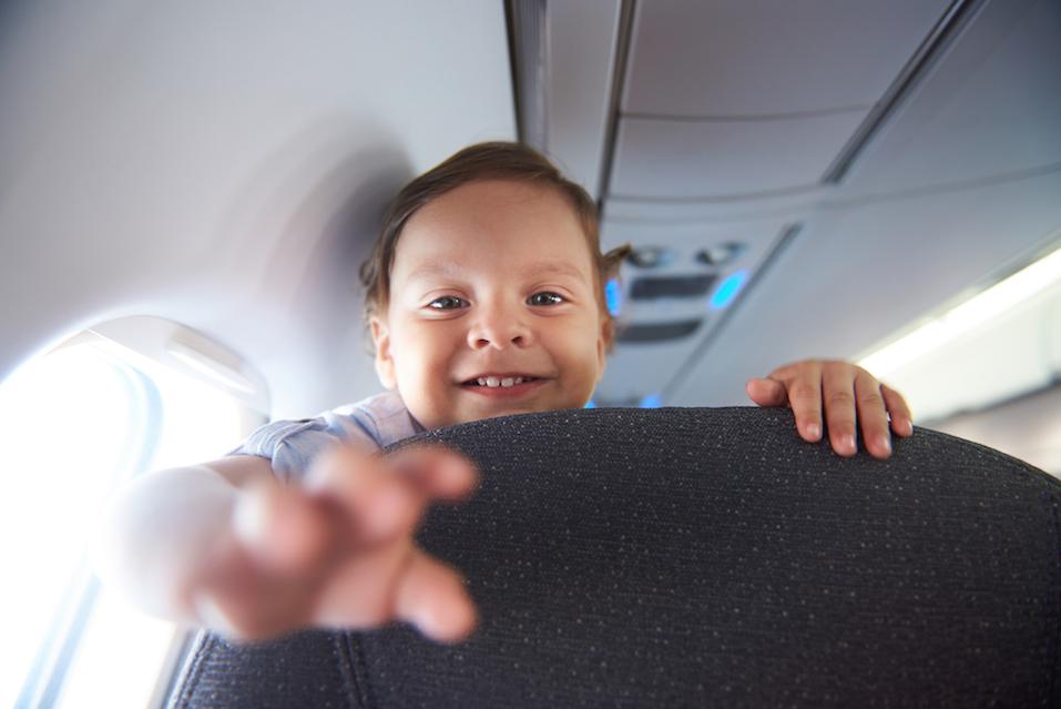 Smiling little boy in aiprlane