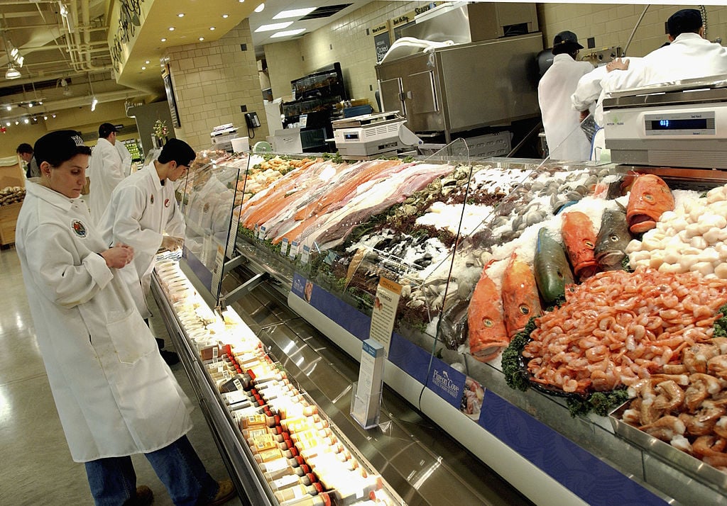 Clerks prepare Whole Foods fish department Clerks prepare Whole Foods fish department