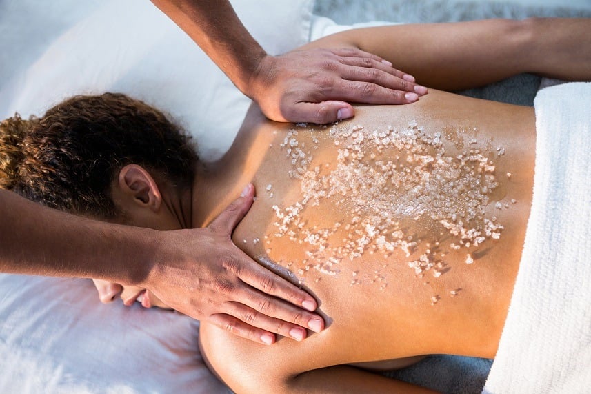 Woman receiving back massage
