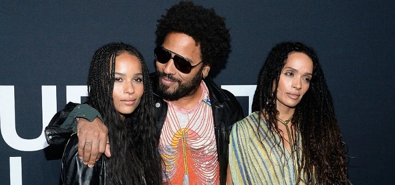 Lisa Bonet, Zoe and Lenny Kravitz pose together on a red carpet.