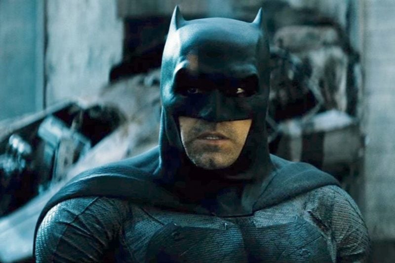 Ben Affleck wears a black cape and suit as Batman