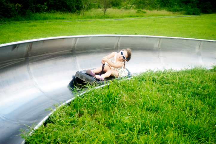 young girls bobsledding