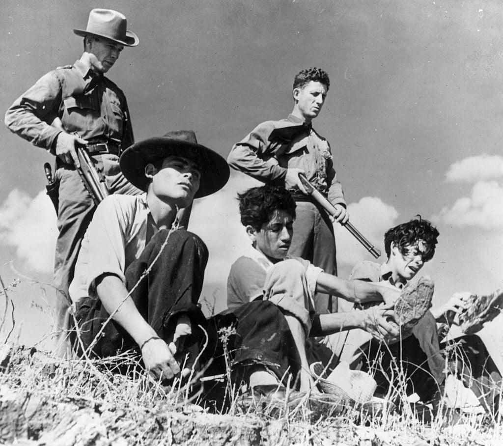 Texas Border Patrol stands guard over immigrants