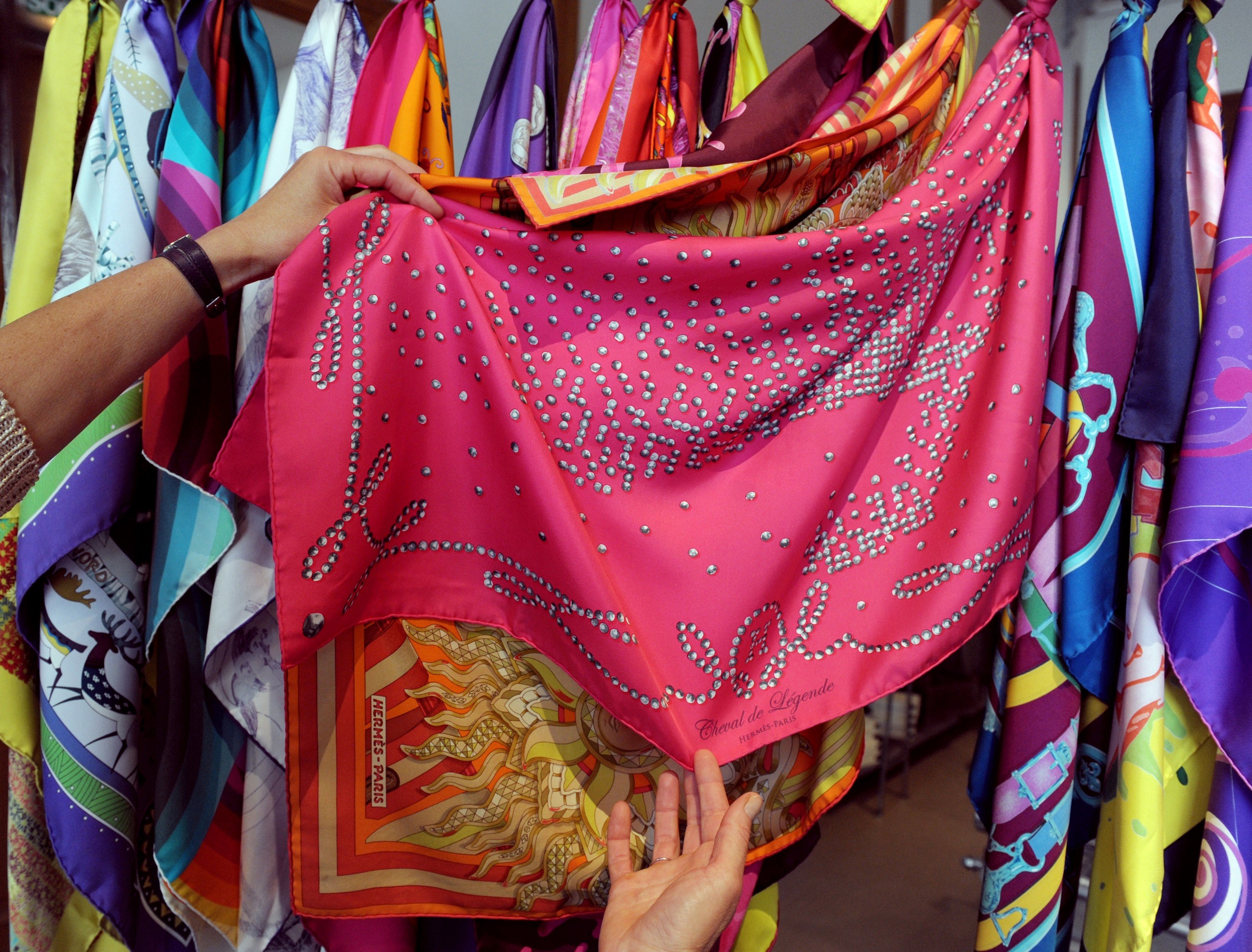 Array of colorful silk scarves