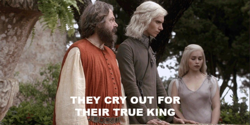 Viserys and Daenerys talk to an advisor.