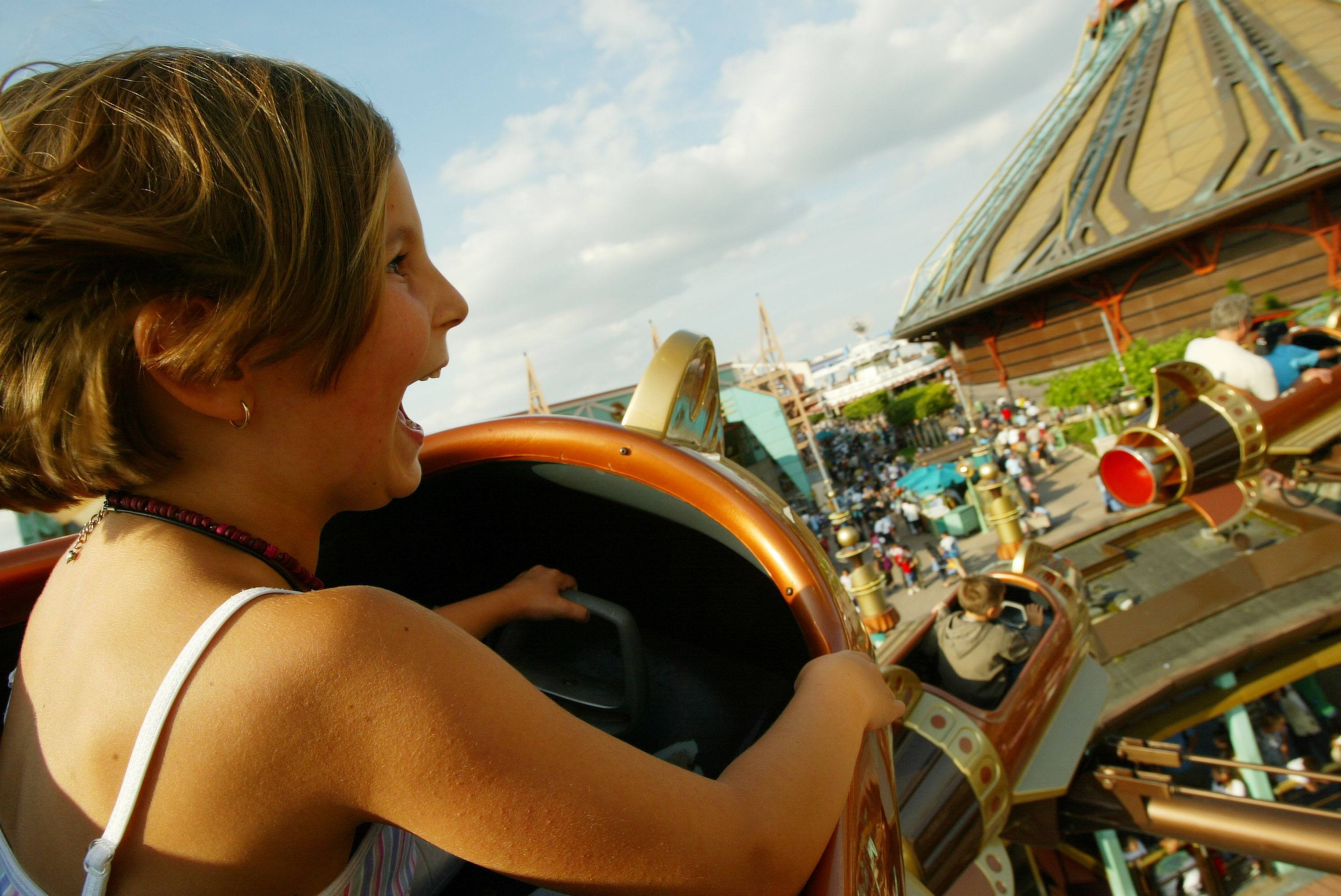 Child having fun on a Disneyland ride
