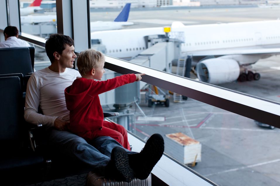 family of two at the airport enjoying time