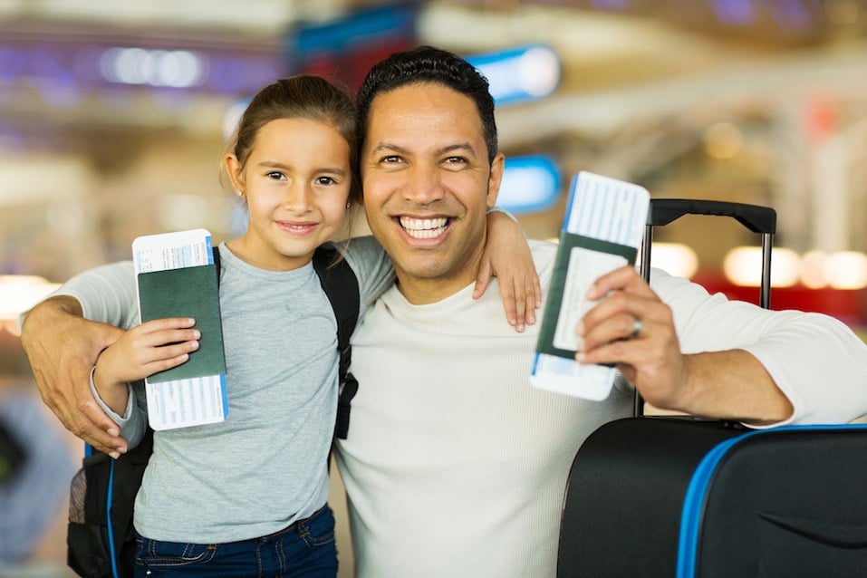 father and daughter at airport
