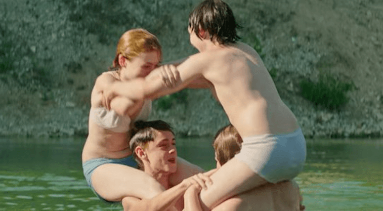 Four kids play in the water Four kids play in the water