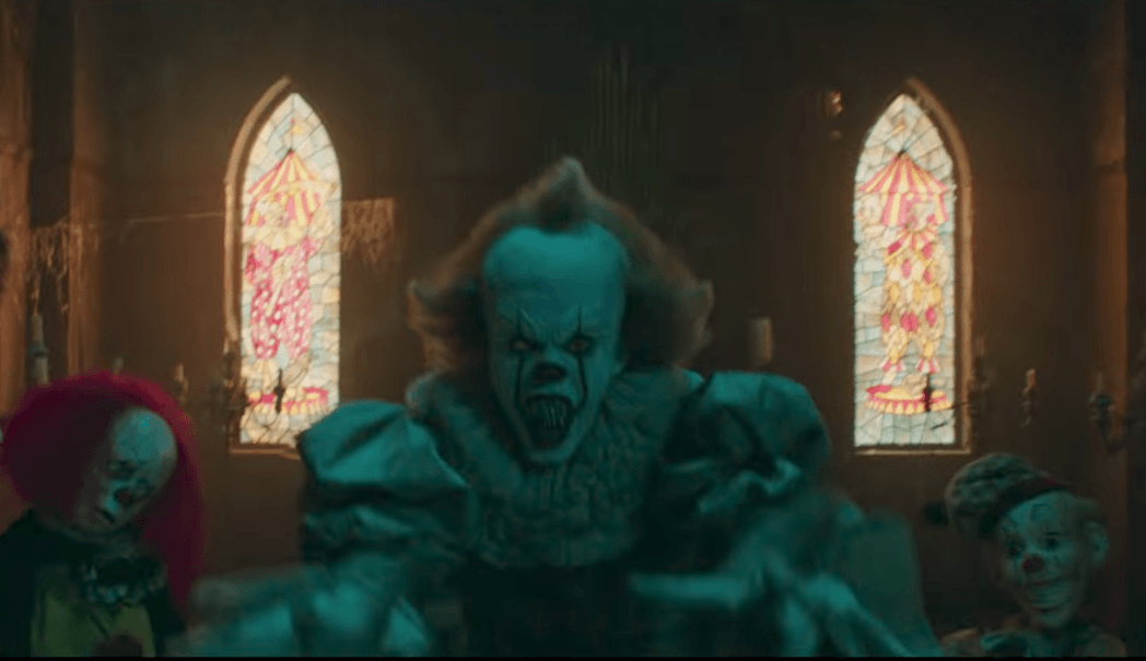 Pennywise lashes out in a room filled with clown dolls Pennywise lashes out in a room filled with clown dolls