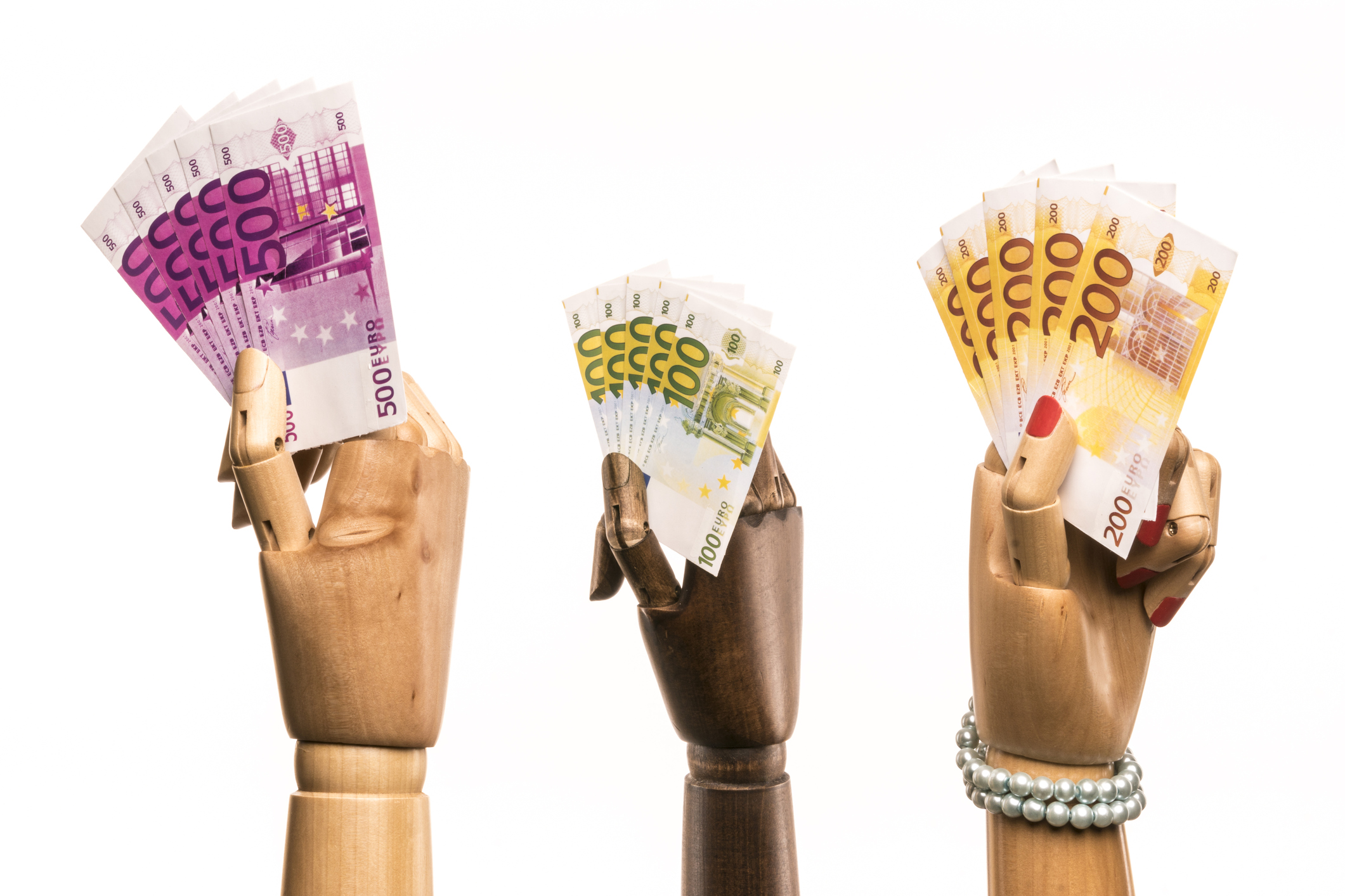 Wooden hands with money