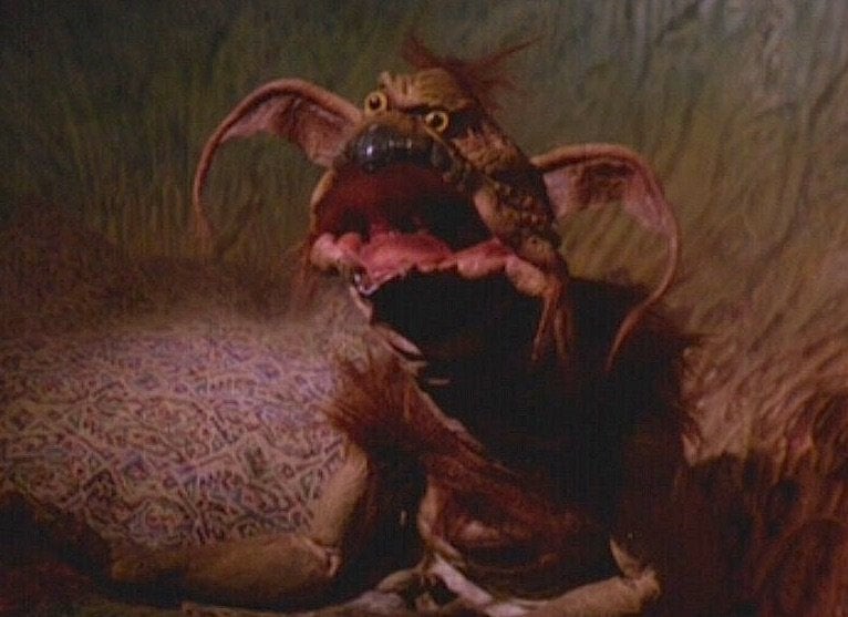 Salacious Crumb laughs in Star Wars: Return of the Jedi Salacious Crumb laughs in Star Wars: Return of the Jedi