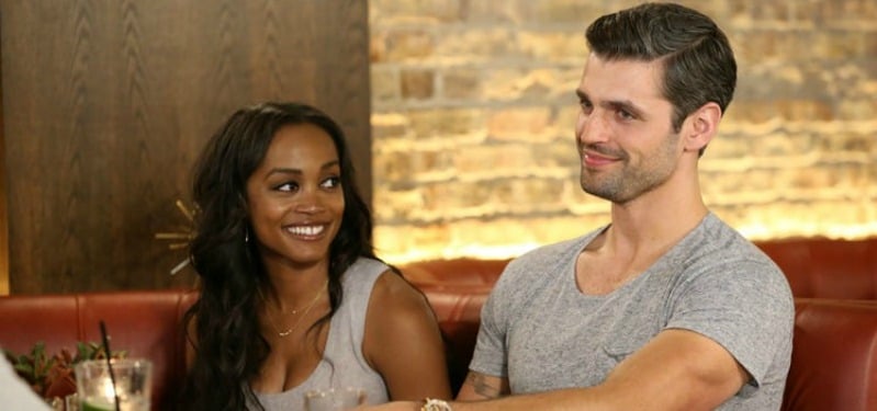 Peter Krause smiling as he sits next to Rachel Lindsay. Peter Krause smiling as he sits next to Rachel Lindsay.