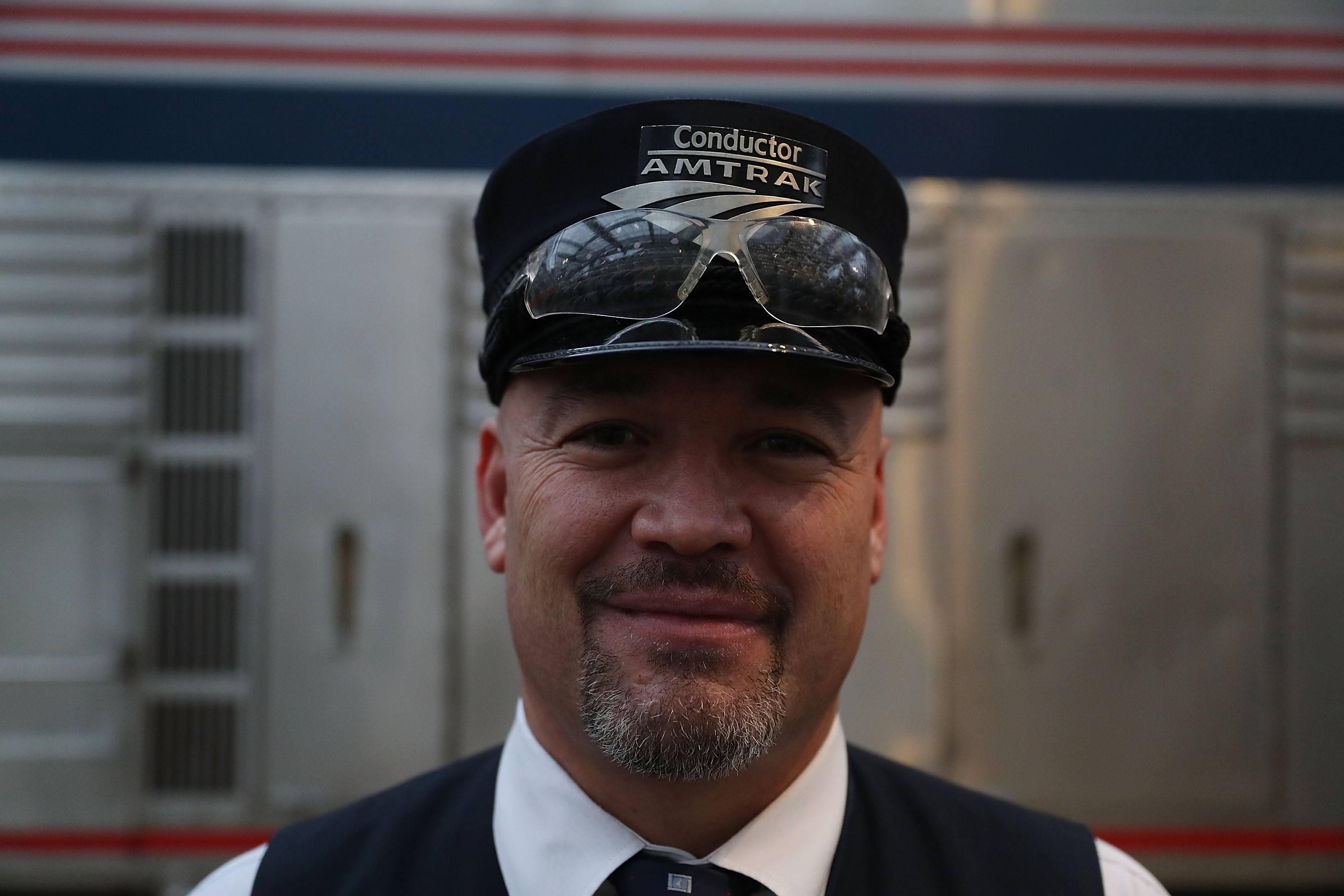 Male train conductor