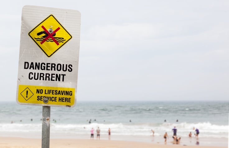 warning sign of dangerous current in ocean