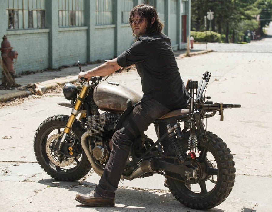 Daryl sits on a motorcycle and looks to his left Daryl sits on a motorcycle and looks to his left