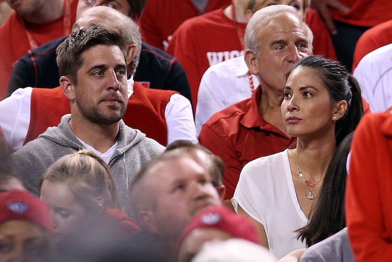 Aaron Rodgers and Olivia Munn look on during a football game in Indiana. Aaron Rodgers and Olivia Munn look on during a football game in Indiana.