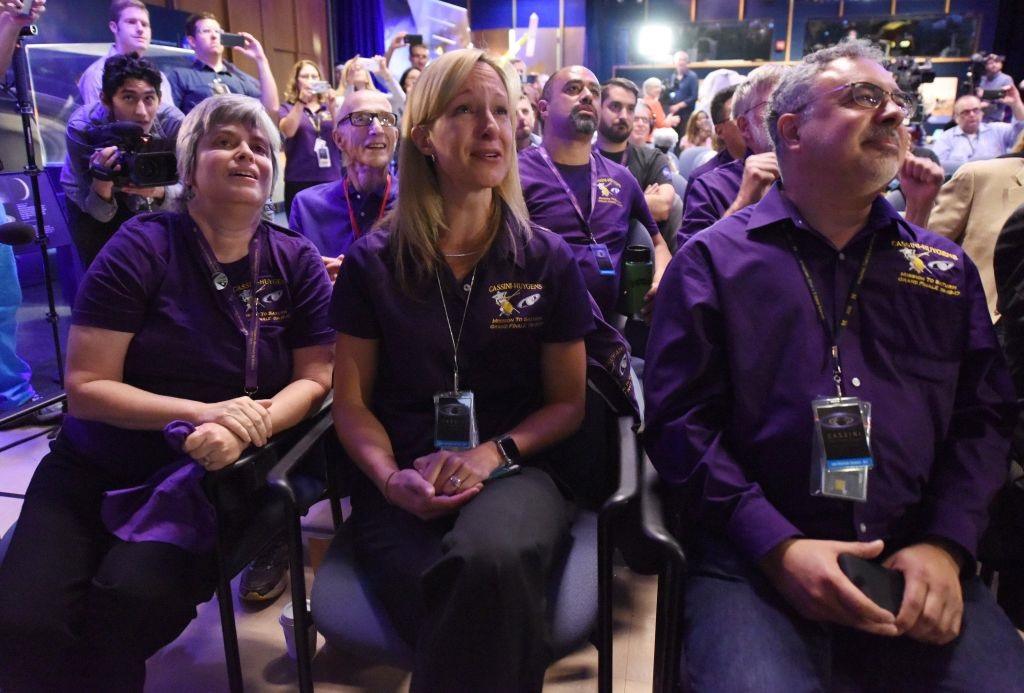 Scientists watch for final loss of signal from the Cassini probe. Cassini scientists watch for the final loss of signal.