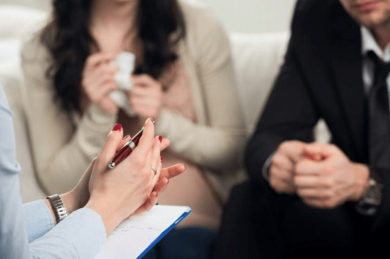 couple in marriage counseling couple in marriage counseling