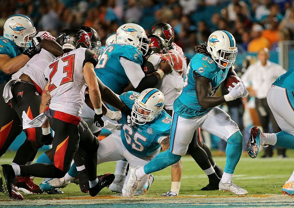 Jay Ajayi rushes during a preseason game