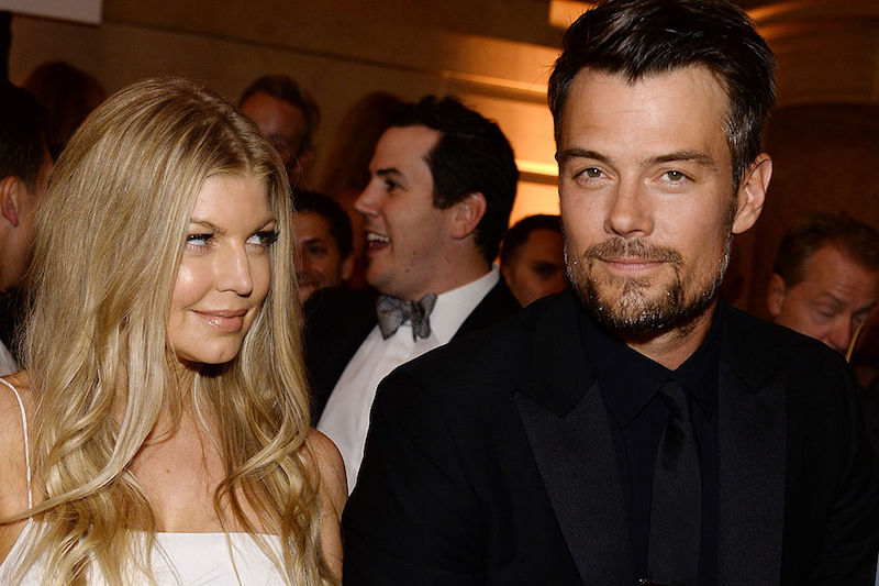 Fergie looks over at her ex-husband as they stand together at a formal event. Fergie looks over at her ex-husband as they stand together at a formal event.