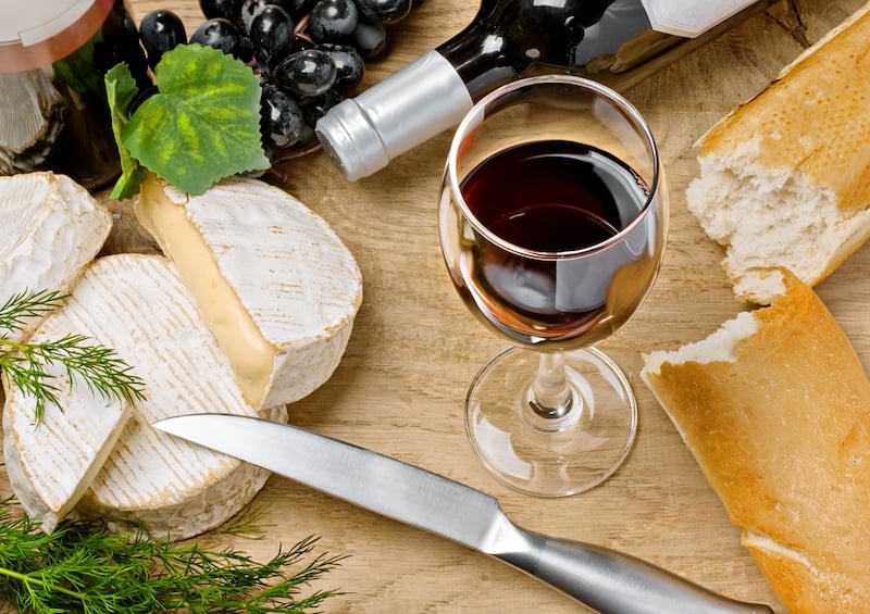 red wine next to cheese and bread red wine next to cheese and bread